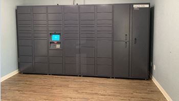 Package Room with 24-Hour Hub Package Locker  at Autumn Oaks Apartments, Roseville, California
